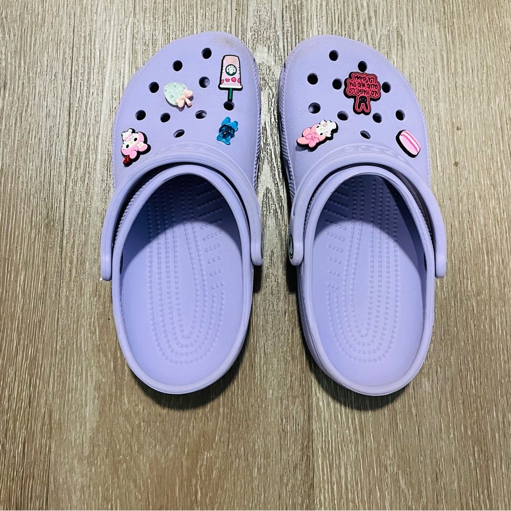 Crocs size woman 7 Lavender charms included